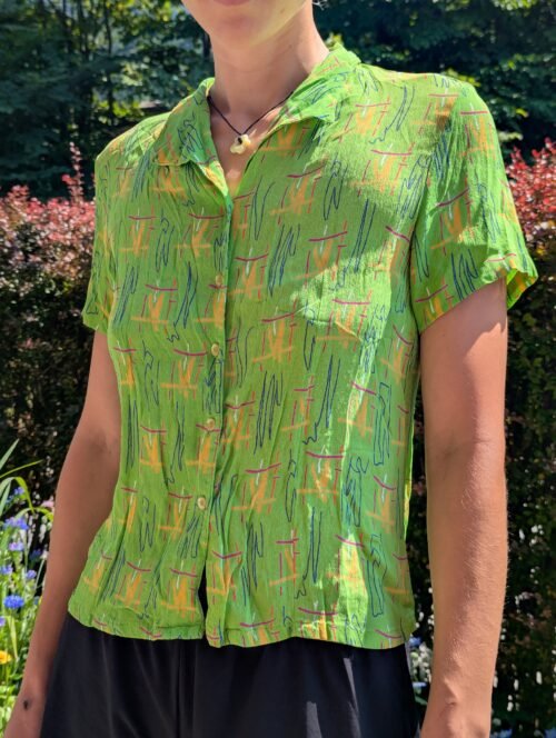 Grüne leuchtende Bluse Second Hand